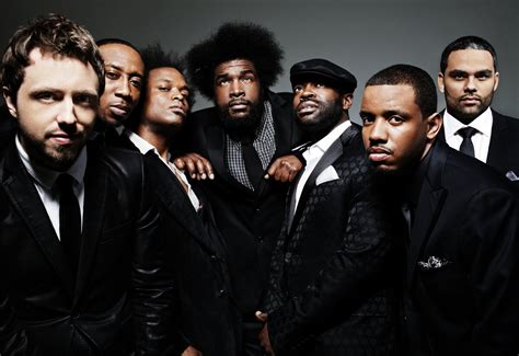 The Roots are an American hip hop band formed in 1987 by Tariq "Black Thought" Trotter and Ahmir "Questlove" Thompson in Philadelphia, Pennsylvania. The Roots serve as the house band on NBC's The Tonight Show Starring Jimmy Fallon, having served in the same role on Late Night with Jimmy Fallon from 2009 to 2014.